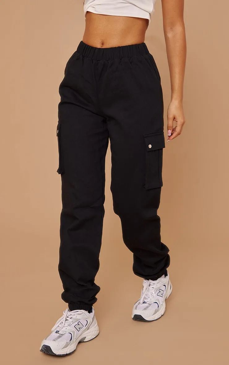 Petite Pantalon cargo noir avec détail poches