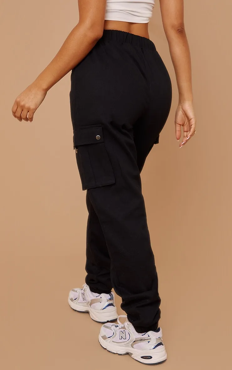 Petite Pantalon cargo noir avec détail poches