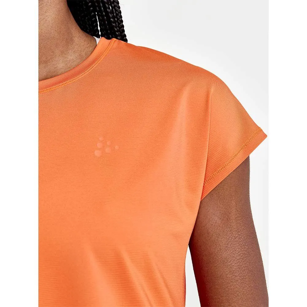 Vêtements de sport Craft Femme | Tee-shirt de running léger et technique Craft Core Charger RIB Tee W Orange pour femme | 191124